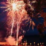Fireworks display over a field by Canberra Crackers